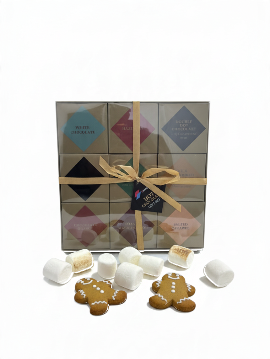 ICMinds Stores luxury hot chocolate gift set with 9 assorted flavours, gingerbread men, and marshmallows in a box.