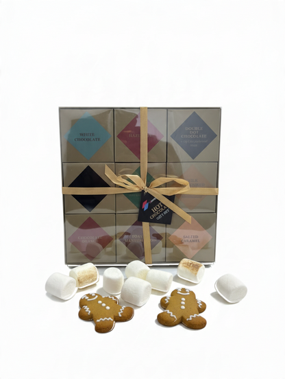 ICMinds Stores luxury hot chocolate gift set with 9 assorted flavours, gingerbread men, and marshmallows in a box.